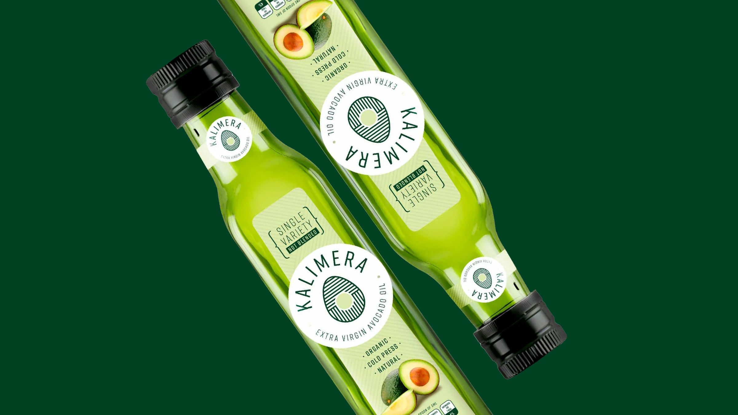 Kalimera – botellas de aceite sobre fondo verde